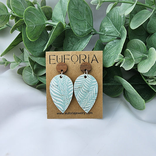 Cork over leather teardrop earrings with  round wood post.  White tropical leaf print over seafoam field.  