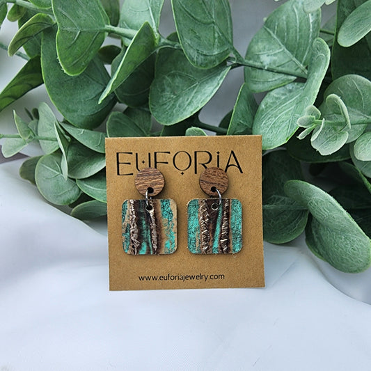 leather square earrings with round wood post. .75" squares in a rustic ridged turquoise, bronze and brown pattern.