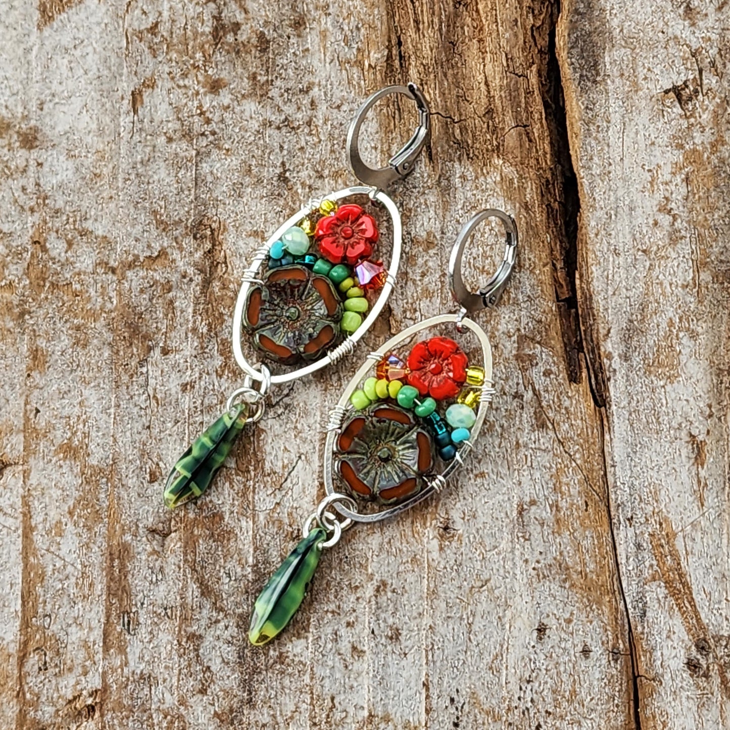 Dangle Earrings - Czech glass flowers, Swarovski, Japanese seed beads woven onto silver oval hoop. Stainless steel euro wires. Length about 2.25"