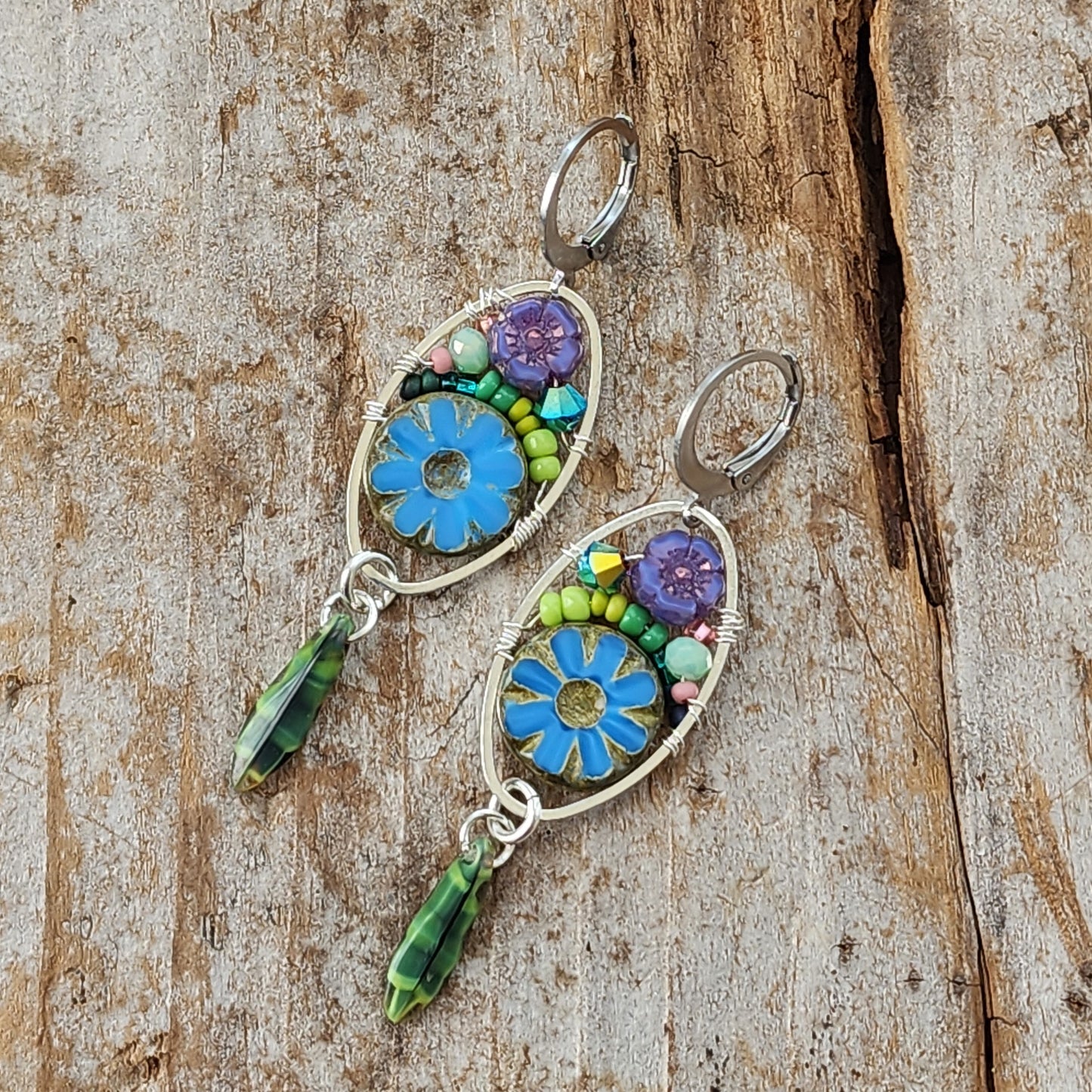 Dangle Earrings - Czech glass flowers, Swarovski, Japanese seed beads woven onto silver oval hoop. Stainless steel euro wires. Length about 2.25"