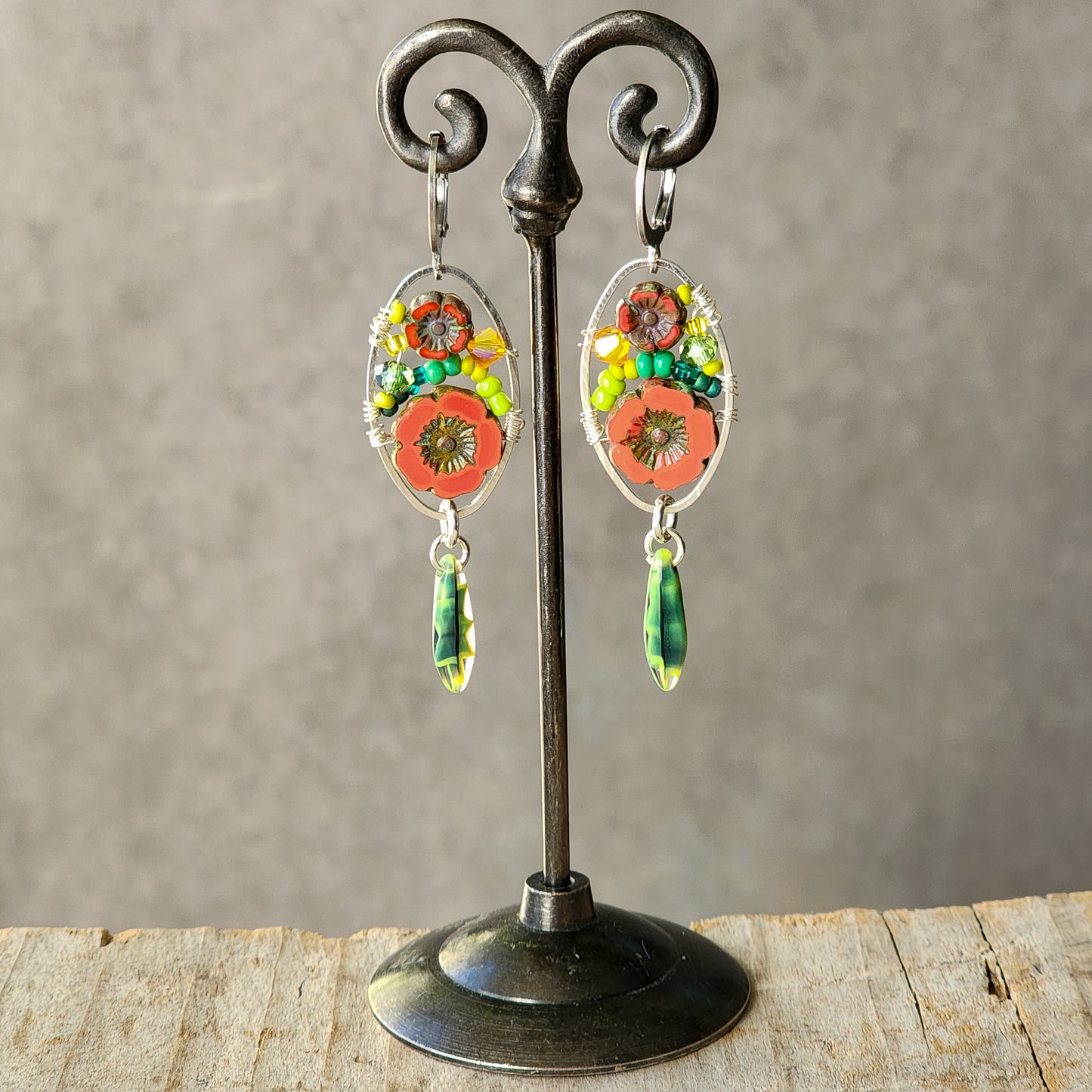 Dangle Earrings - Czech glass flowers, Swarovski, Japanese seed beads woven onto silver oval hoop. Stainless steel euro wires. Length about 2.25"