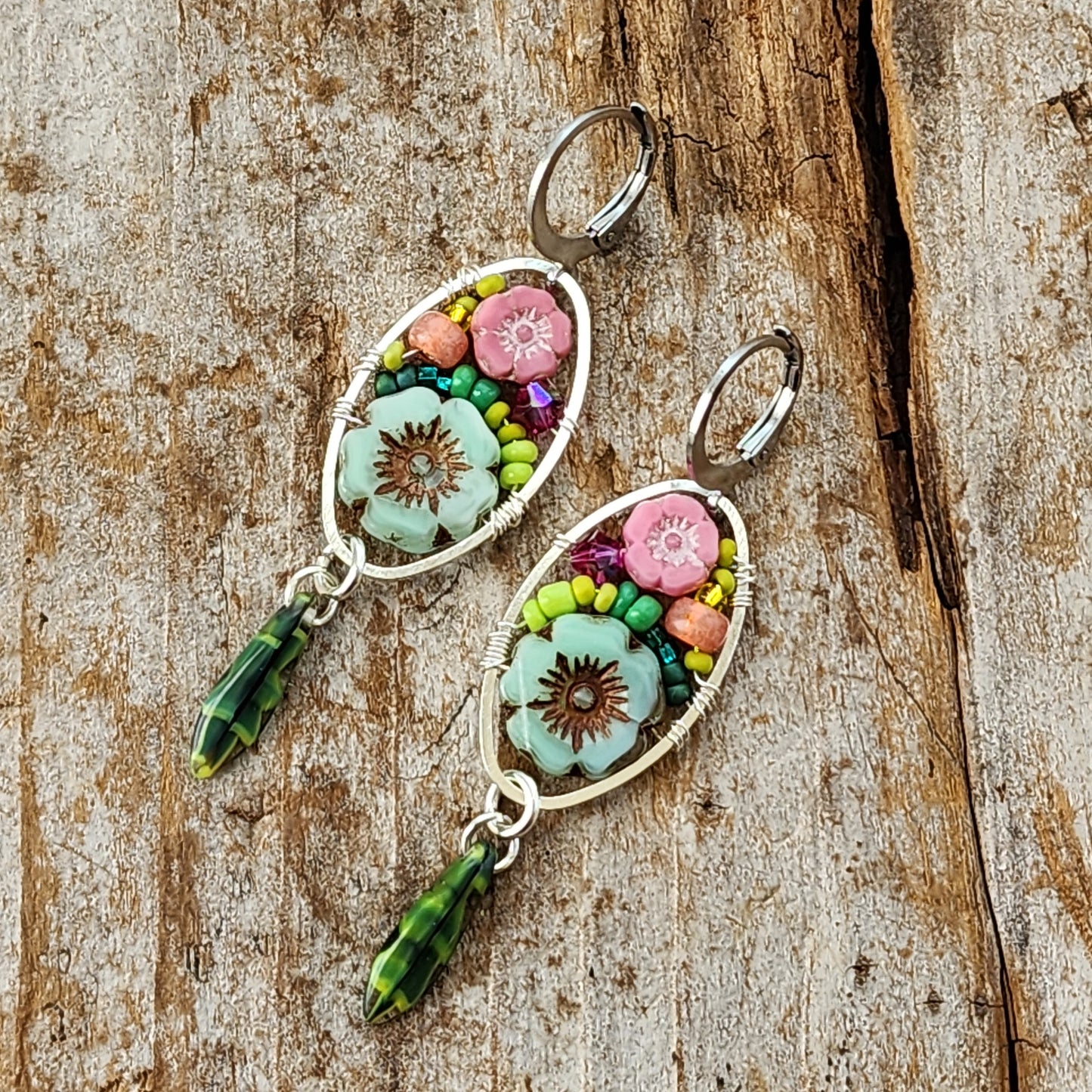 Dangle Earrings - Czech glass flowers, Swarovski, Japanese seed beads woven onto silver oval hoop. Stainless steel euro wires. Length about 2.25"