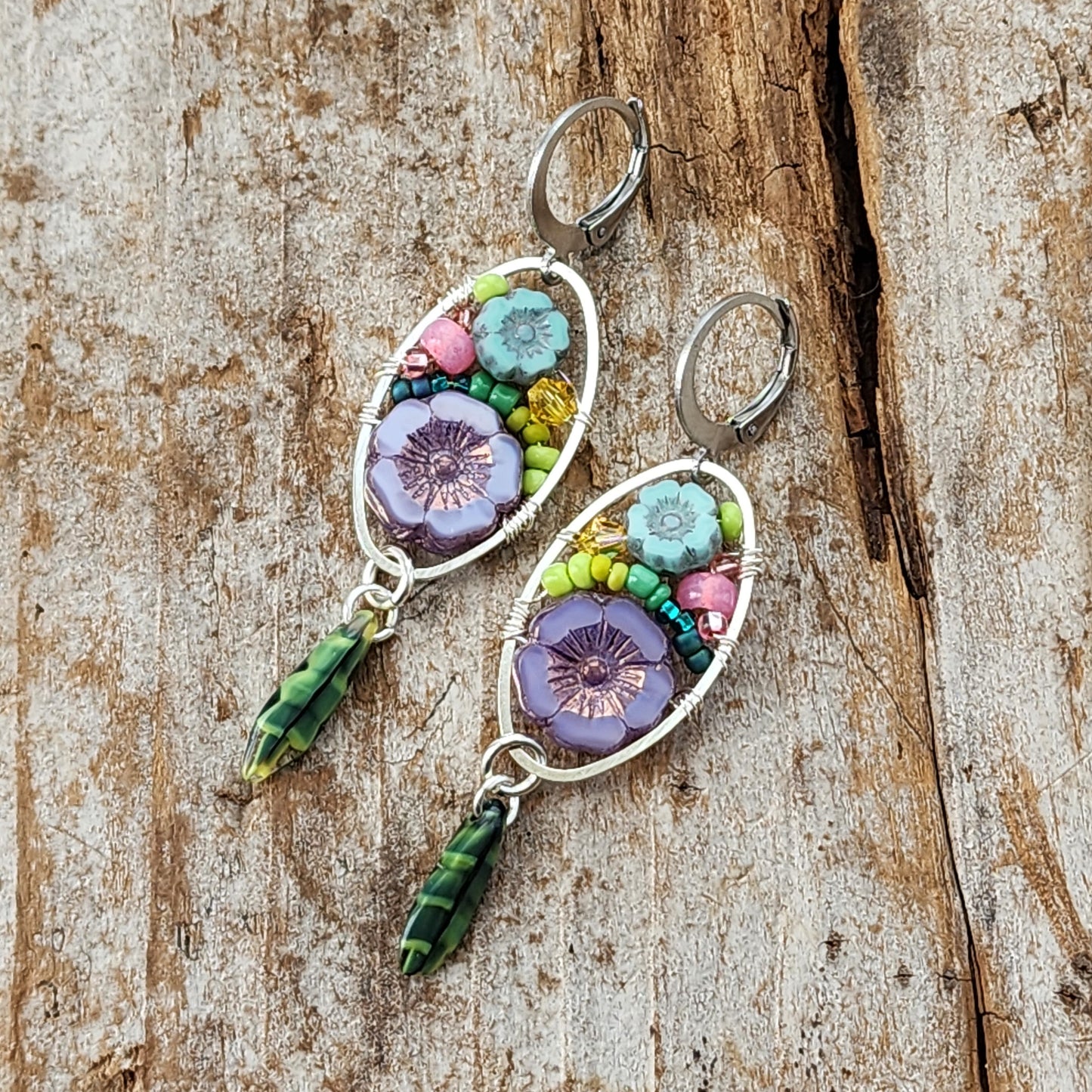 Dangle Earrings - Czech glass flowers, Swarovski, Japanese seed beads woven onto silver oval hoop. Stainless steel euro wires. Length about 2.25"
