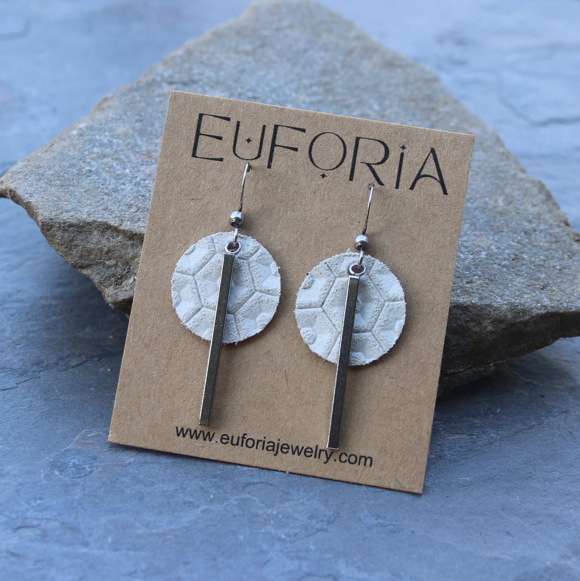 White beehive pattern leather .75" circle and stainless bar charm dangle earrings