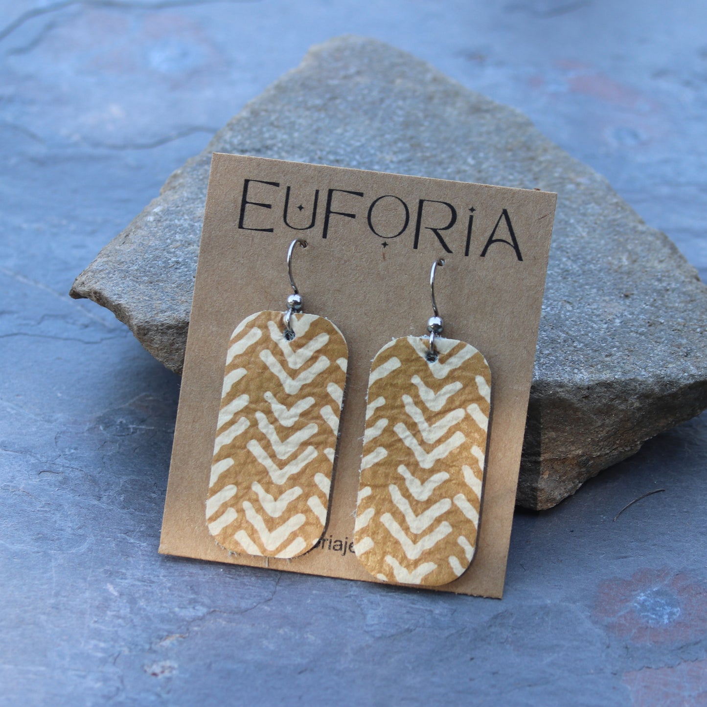 Mustard and white chevron pattern small barrel leather earring. Stainless ear wire, total length 2"