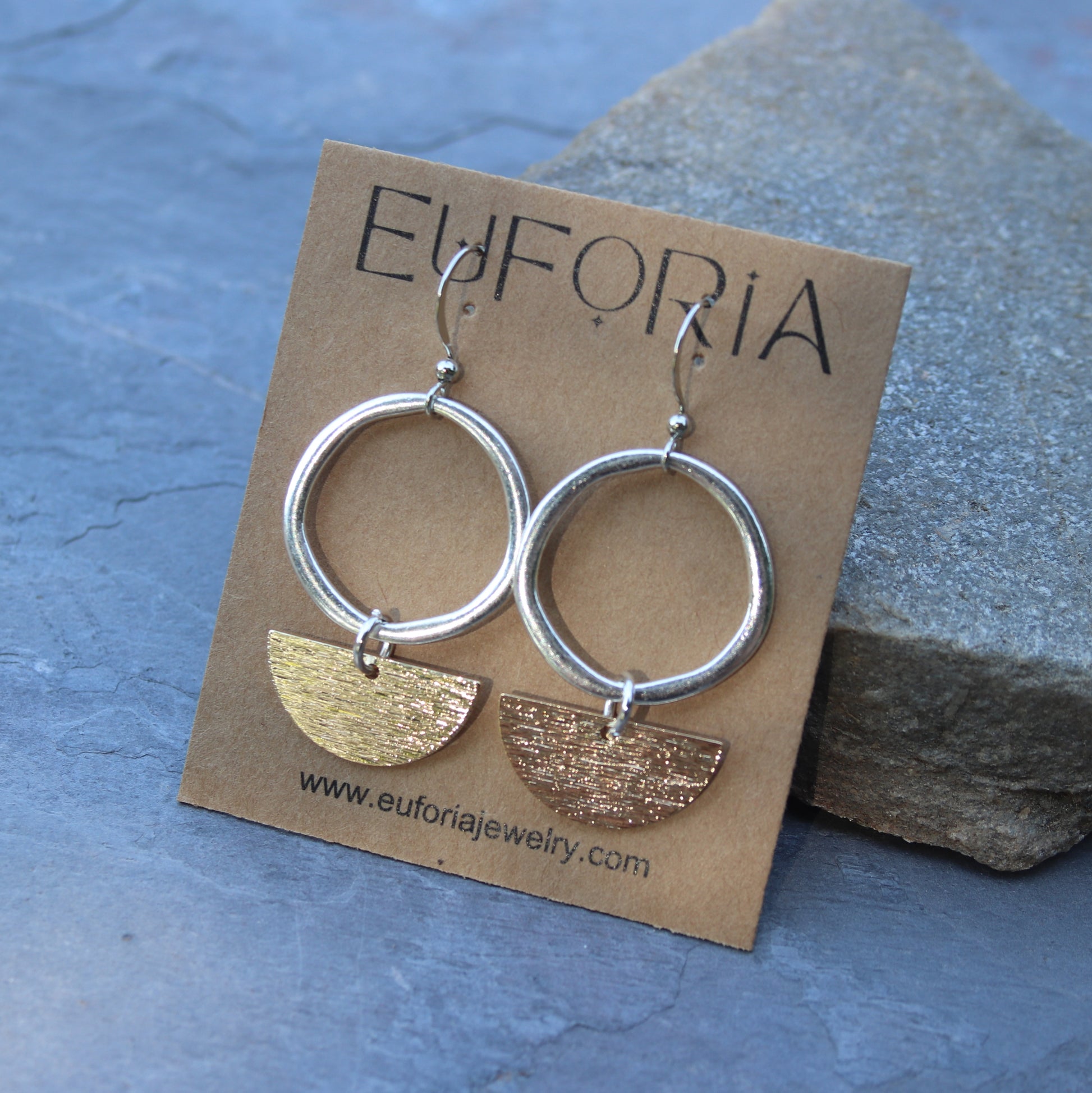 Organic silver plated open circle charm with brushed brass half circle charm dangle earrings.   Circle charm is a touch under 1" wide OD. Stainless ear wires, total length 2"