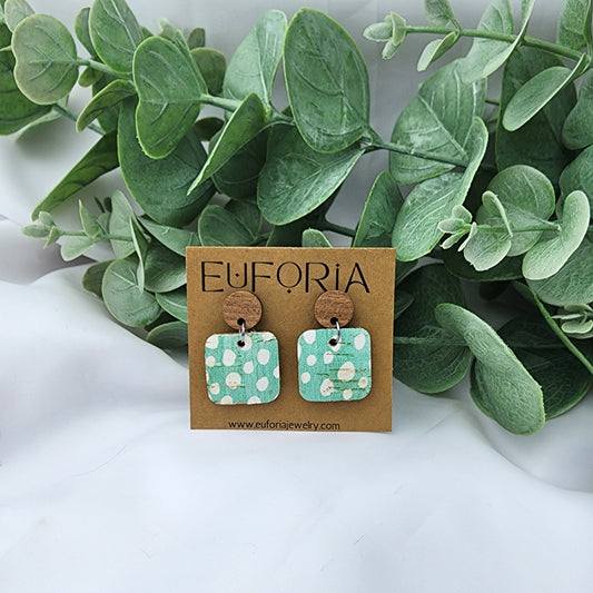 Cork over leather square earrings with round wood post. .75" squares rustic white dots over a seafoam field.