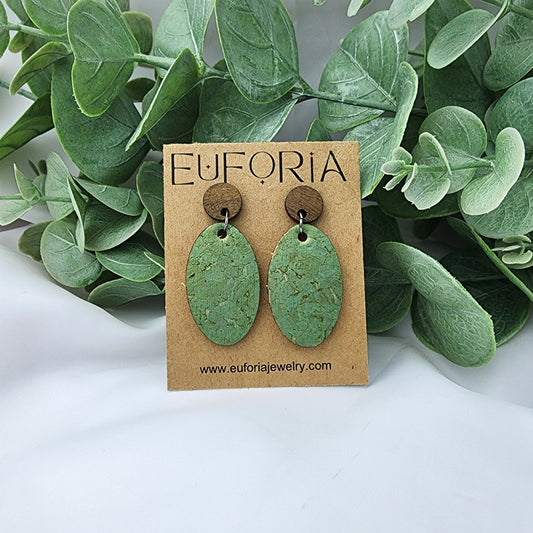 cork over leather oval earrings with round wood post.  1.25" ovals in green with a light gold wash for subtle metallic shimmer.