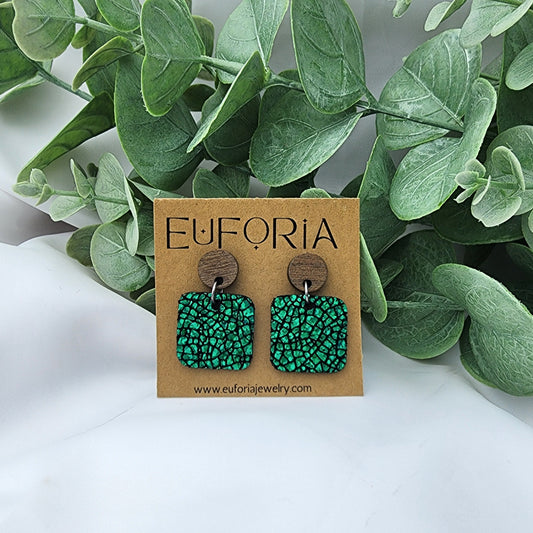 leather square earrings with round wood post. .75" squares in emerald cracked metallic halo (holographic).