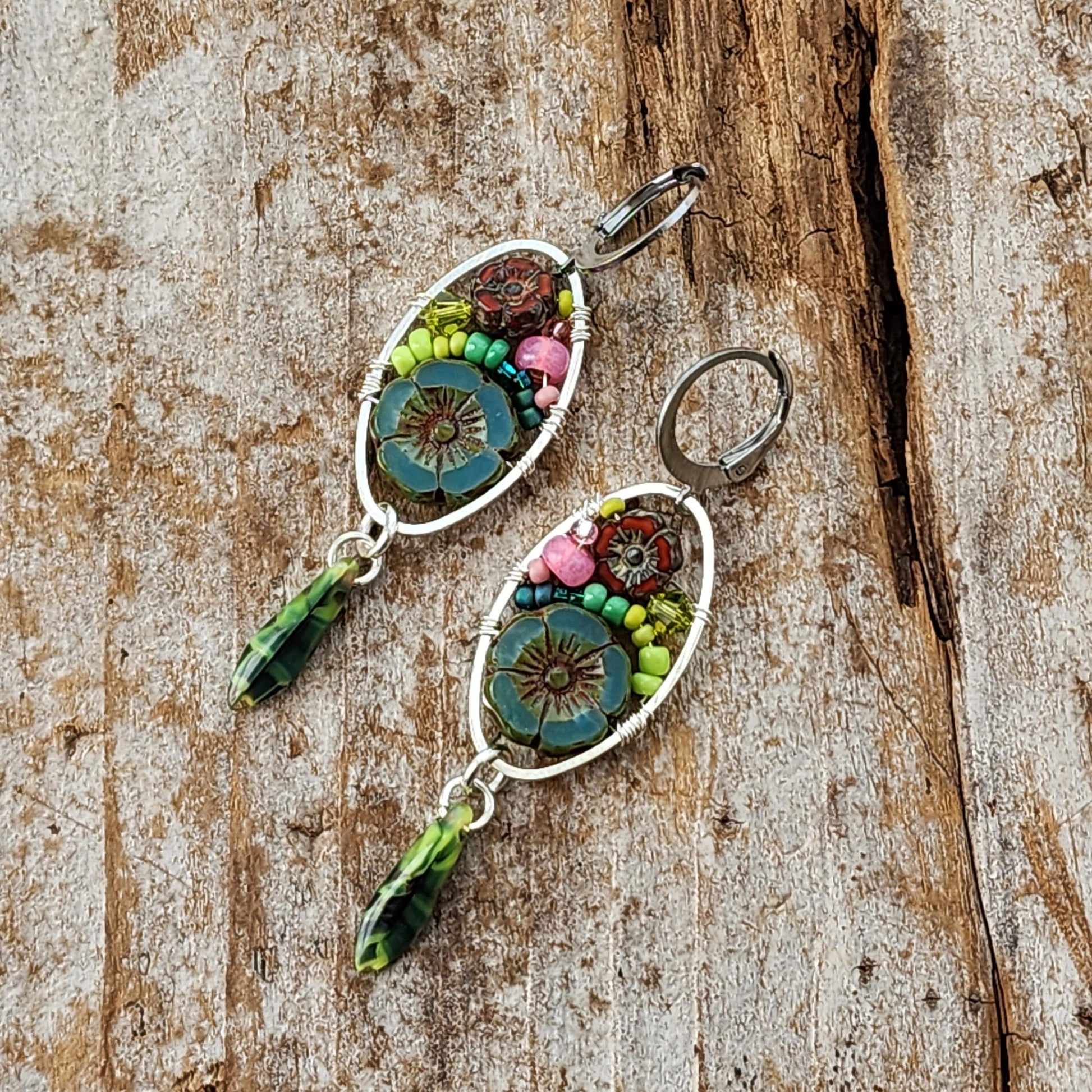 Dangle Earrings - Czech glass flowers, Swarovski, Japanese seed beads woven onto silver oval hoop. Stainless steel euro wires. Length about 2.25"