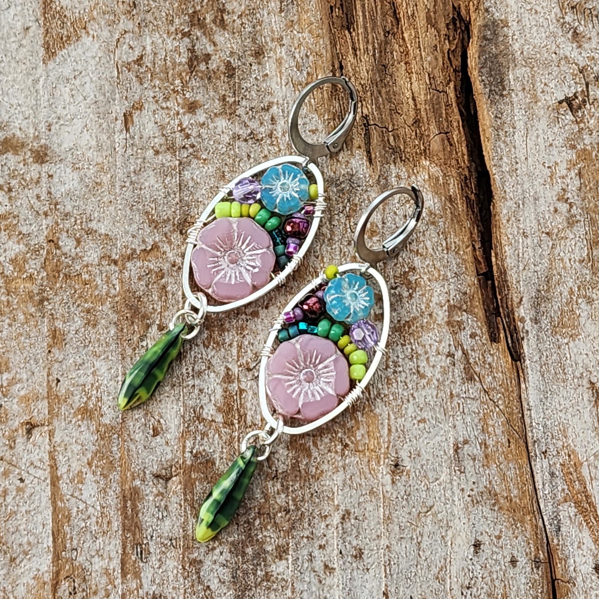 Dangle Earrings - Czech glass flowers, Swarovski, Japanese seed beads woven onto silver oval hoop. Stainless steel euro wires. Length about 2.25"