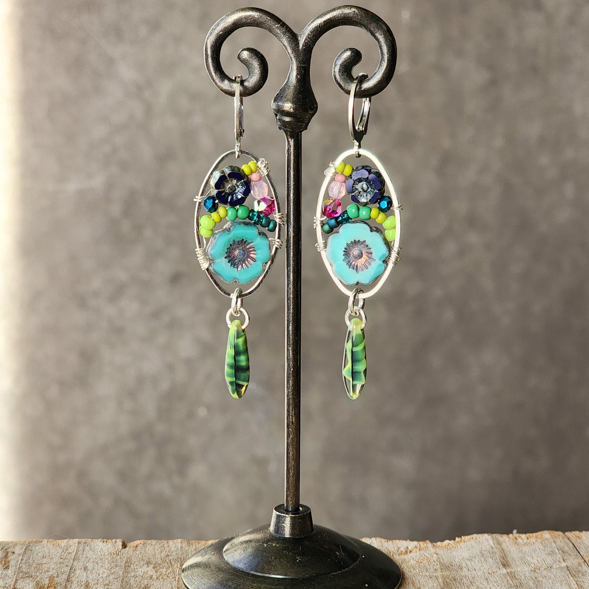 Dangle Earrings - Czech glass flowers, Swarovski, Japanese seed beads woven onto silver oval hoop. Stainless steel euro wires. Length about 2.25"