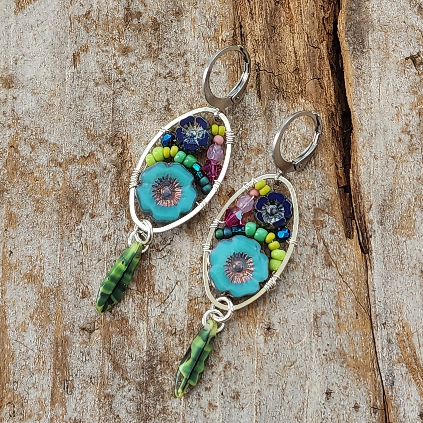 Dangle Earrings - Czech glass flowers, Swarovski, Japanese seed beads woven onto silver oval hoop. Stainless steel euro wires. Length about 2.25"