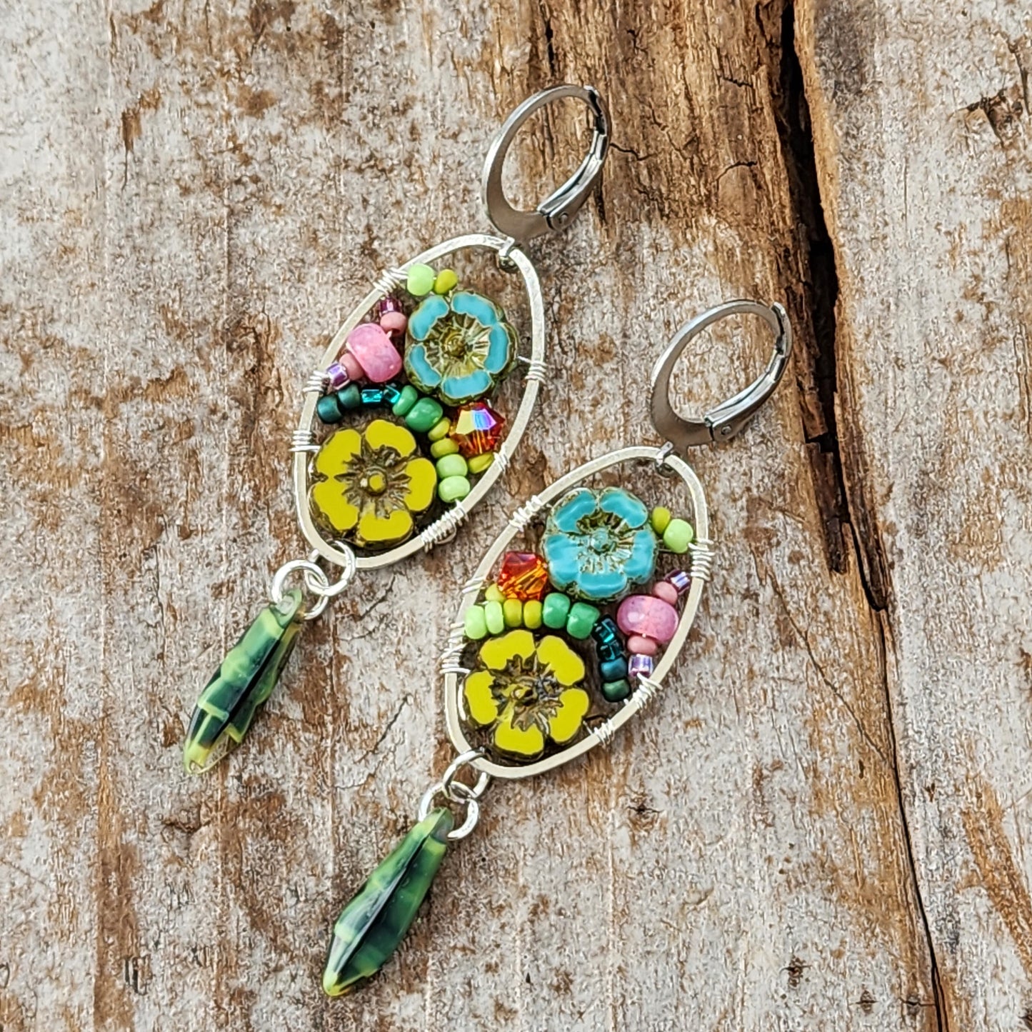 Dangle Earrings - Czech glass flowers, Swarovski, Japanese seed beads woven onto silver oval hoop. Stainless steel euro wires. Length about 2.25"