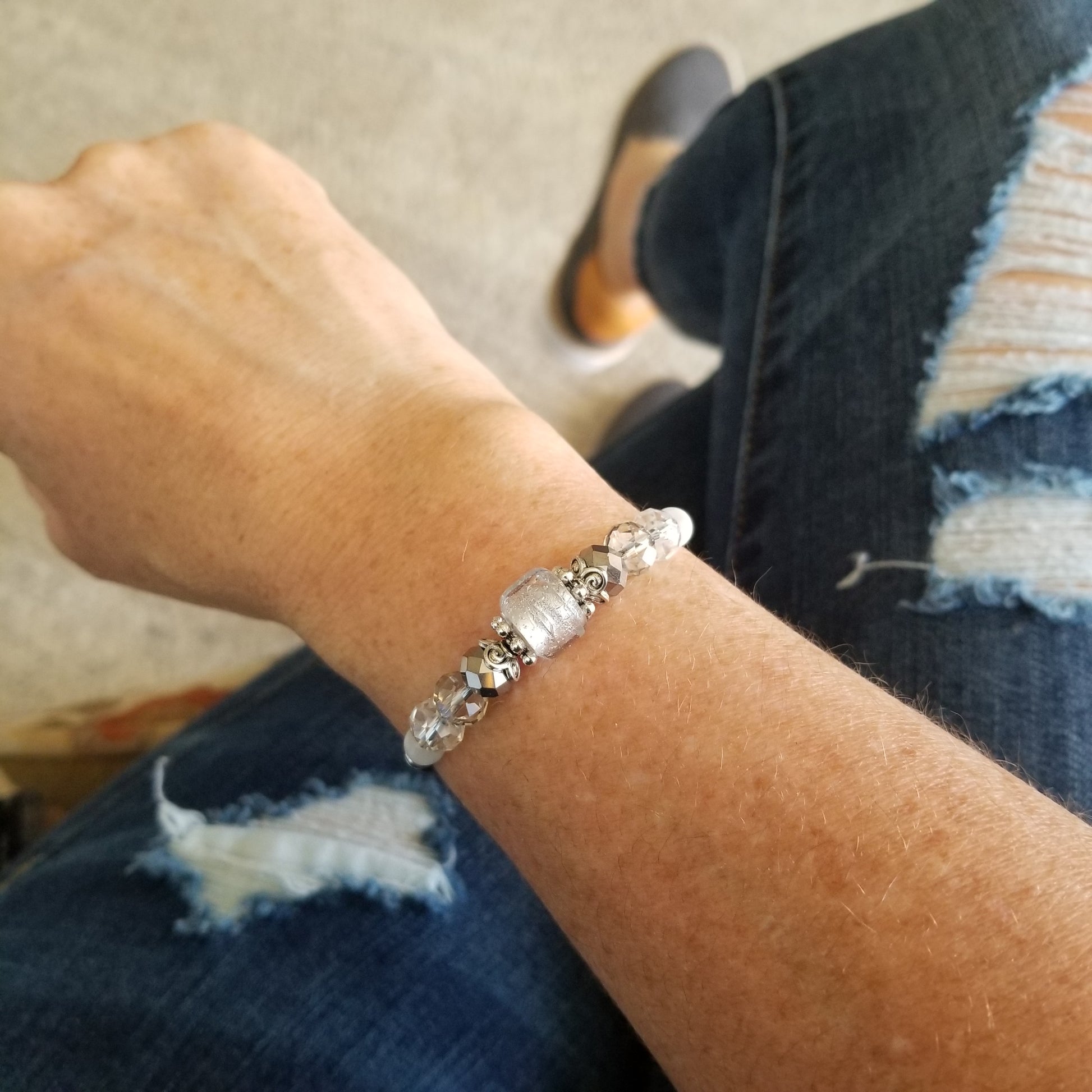 clear foil glass bead with coordinating glass beads wrap bracelet on wrist