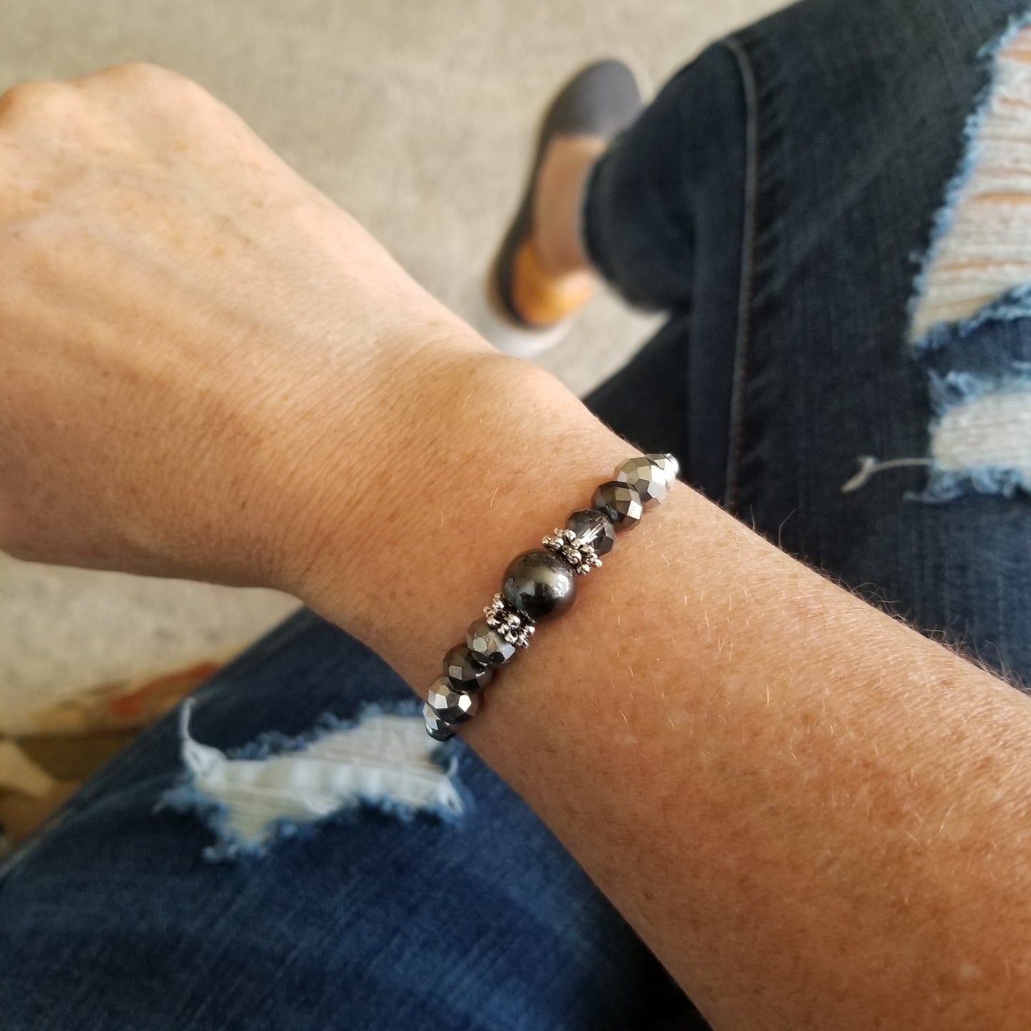 hematite and faceted glass wrap bracelet on wrist