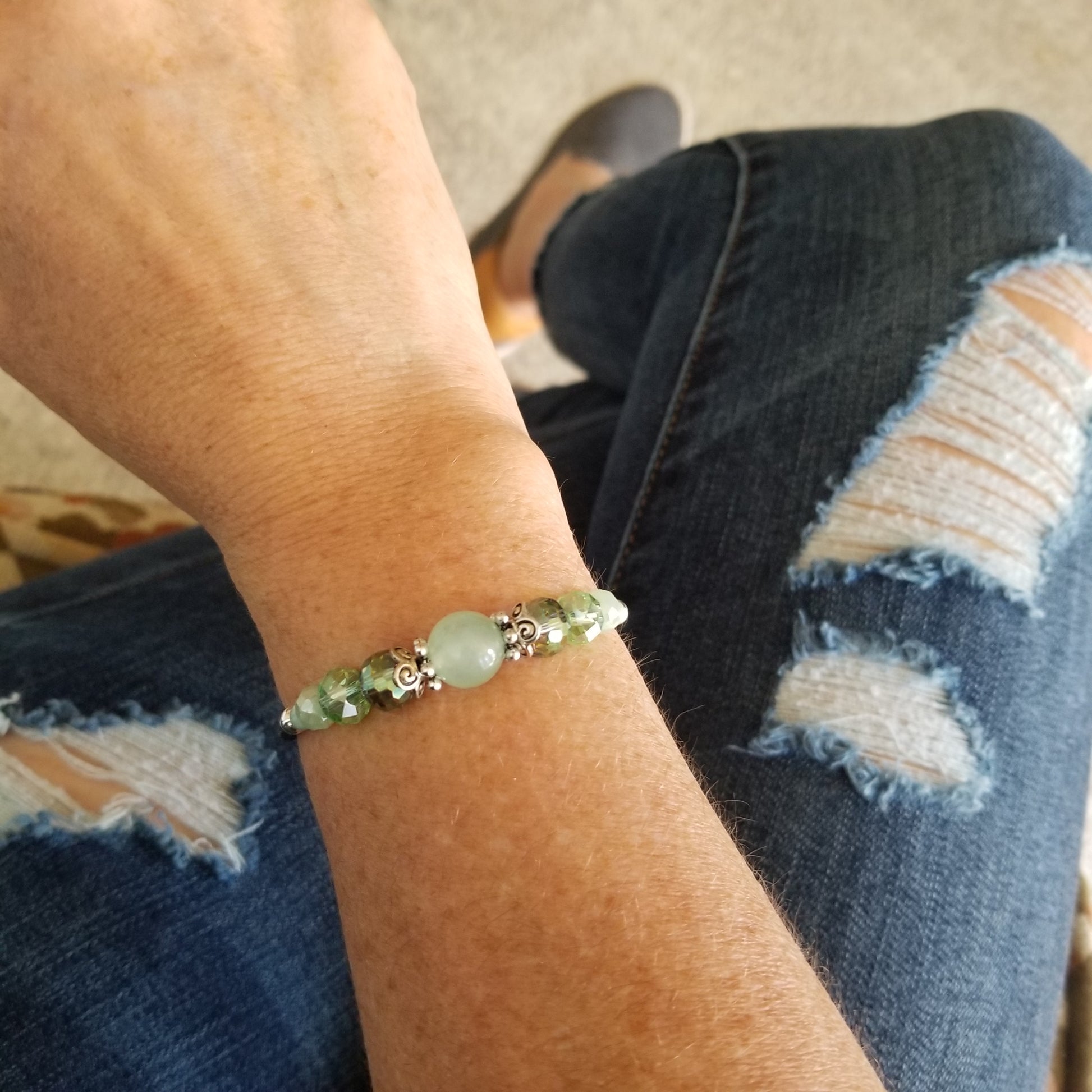 mint quartz and coordinating glass beads wrap bracelet on wrist