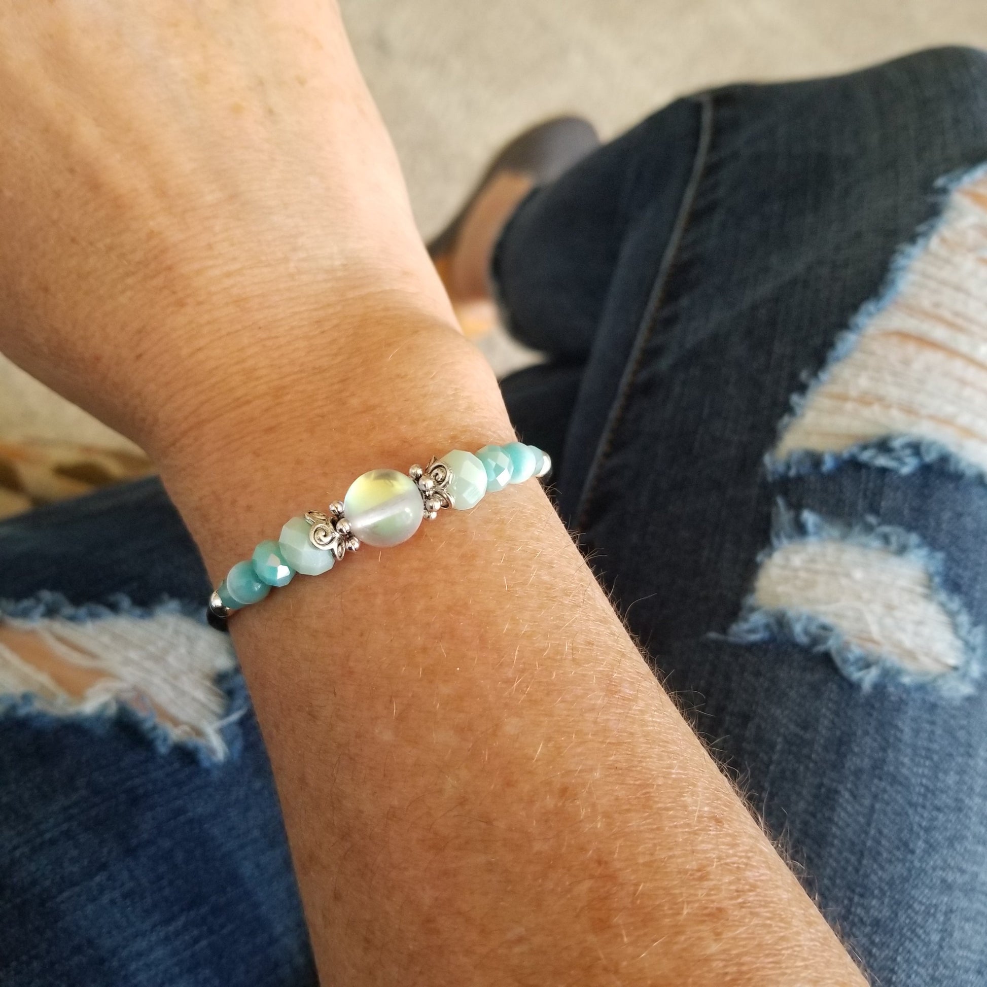 rainbow glass bead with coordinating beads wrap bracelet on wrist